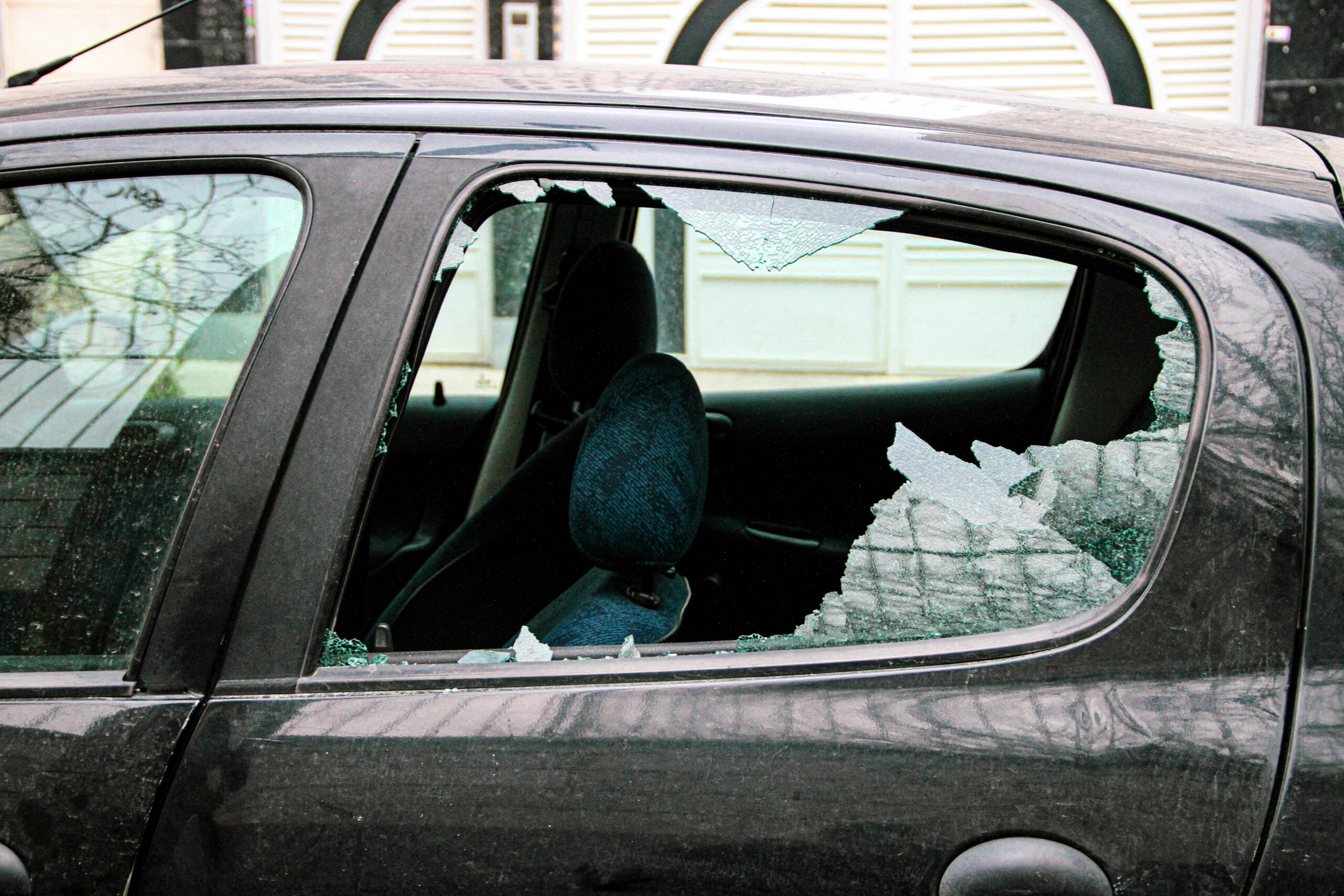 Car with a smashed rear side window